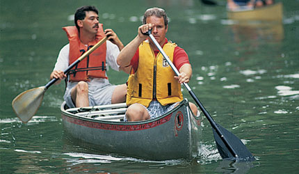 Two men canoeing on the Green River in Mammoth Cave National Park.